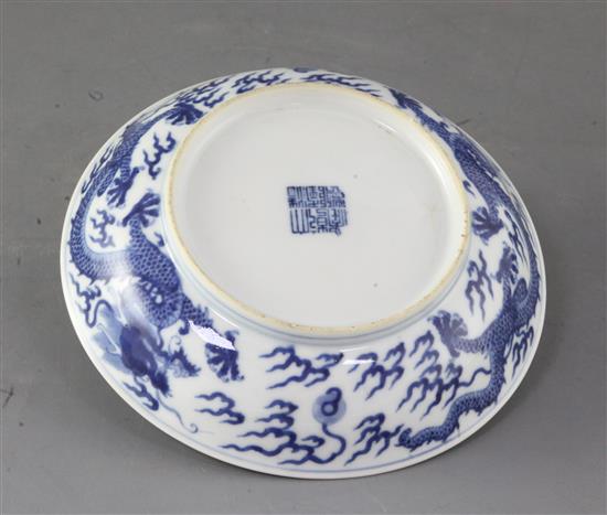 A Chinese blue and white dragon saucer dish, 19th century, 17.2cm